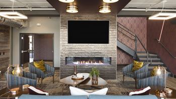 Quaint Fireplace Sitting Area In Clubroom at Galante at Parkside, Minnesota, 55124